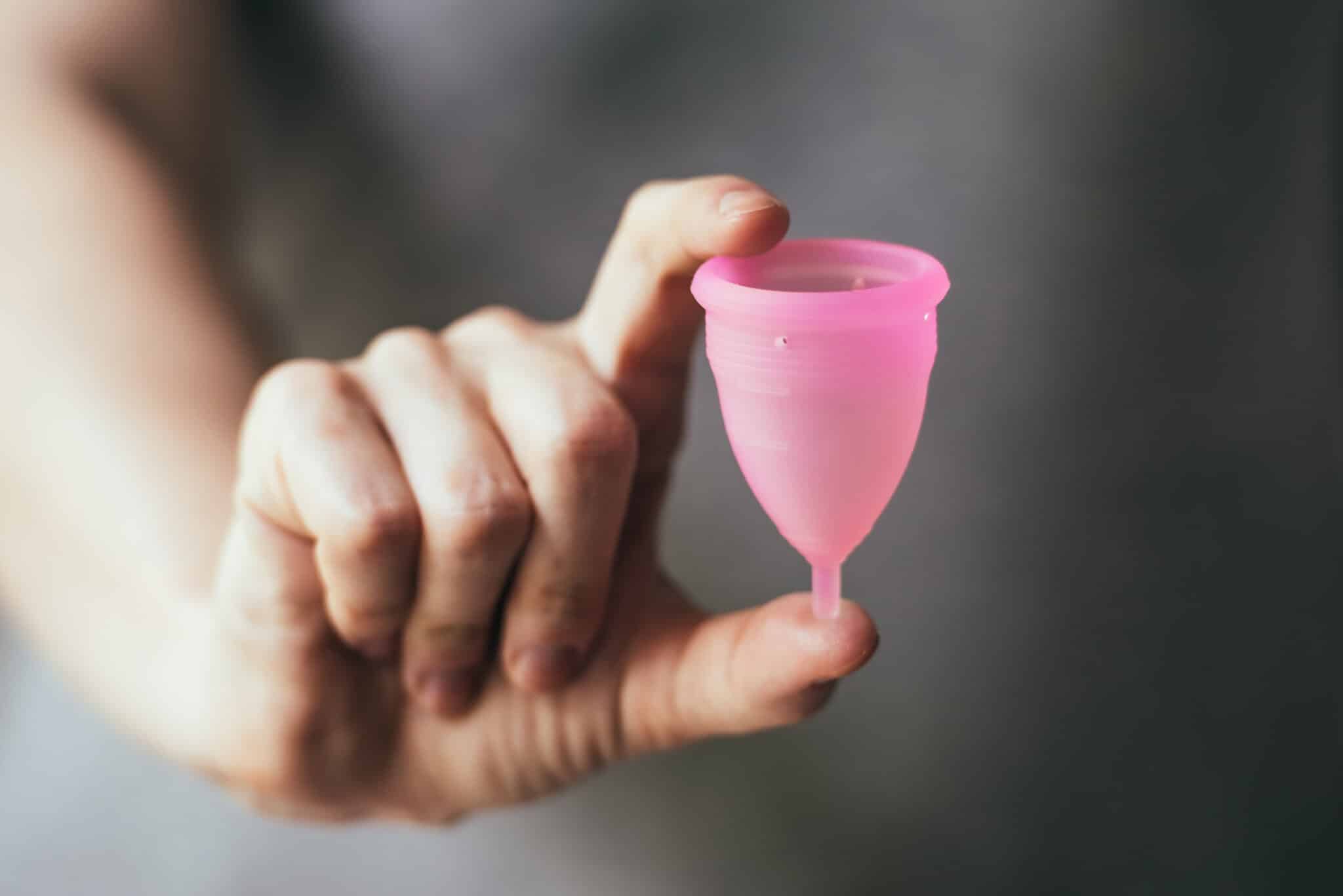 Young,Woman,Hand,Holding,Menstrual,Cup ,Selective,Focus,And,Shallow