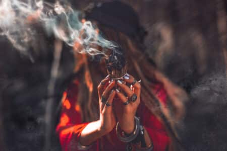 Close,Up,Of,Woman,Hands,With,Shamanic,Fire,Outdoors