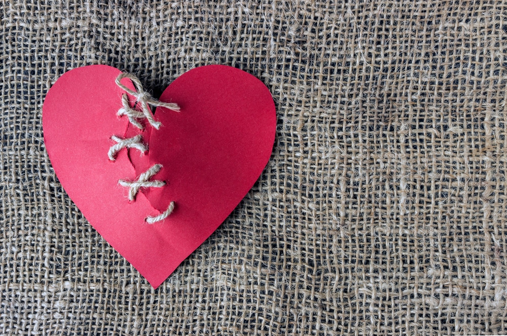A,Broken,Red,Heart ,Sewn,Thread ,The,Concept,Of,Divorce,