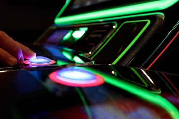 Person,Gambling,On,Casino,Blackjack,And,Slot,Machines,On,A