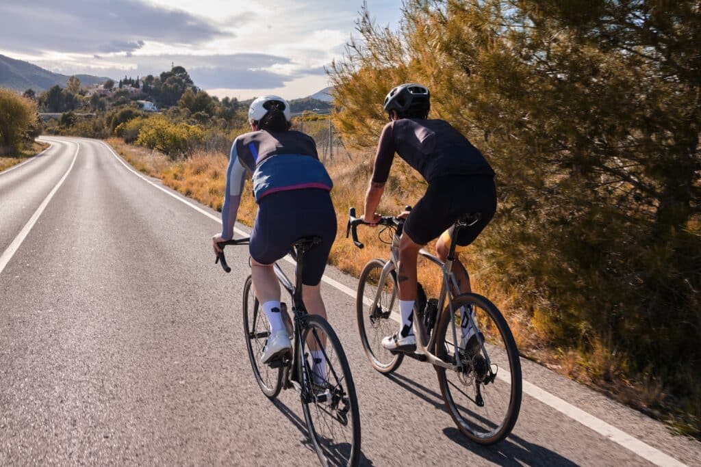 Two,Professional,Cyclist,Racers ,Close,Up,Back,View,Of,Cycling