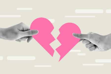 Two,Hands,Tearing,Heart,Apart,,Broken,Heart,Concept ,Breaking,Up