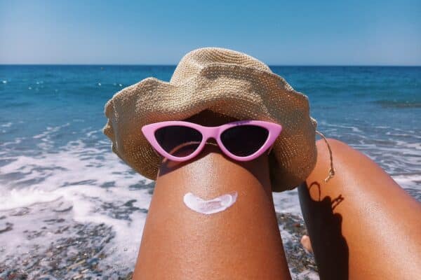 beach fun with sunglasses hat and sunscreen utc