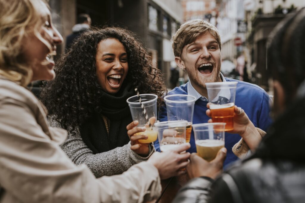 friends gather together to celebrate in the city utc